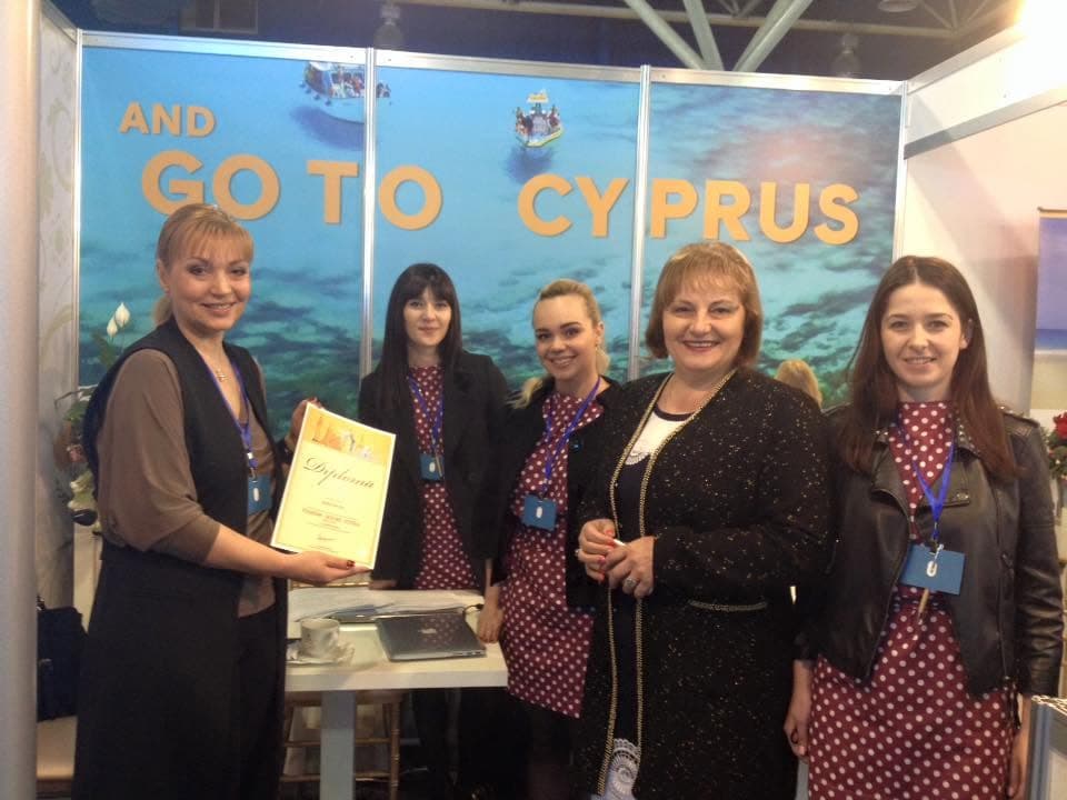 The team with a diploma at the “Go to Cyprus” tourism exhibition stand.