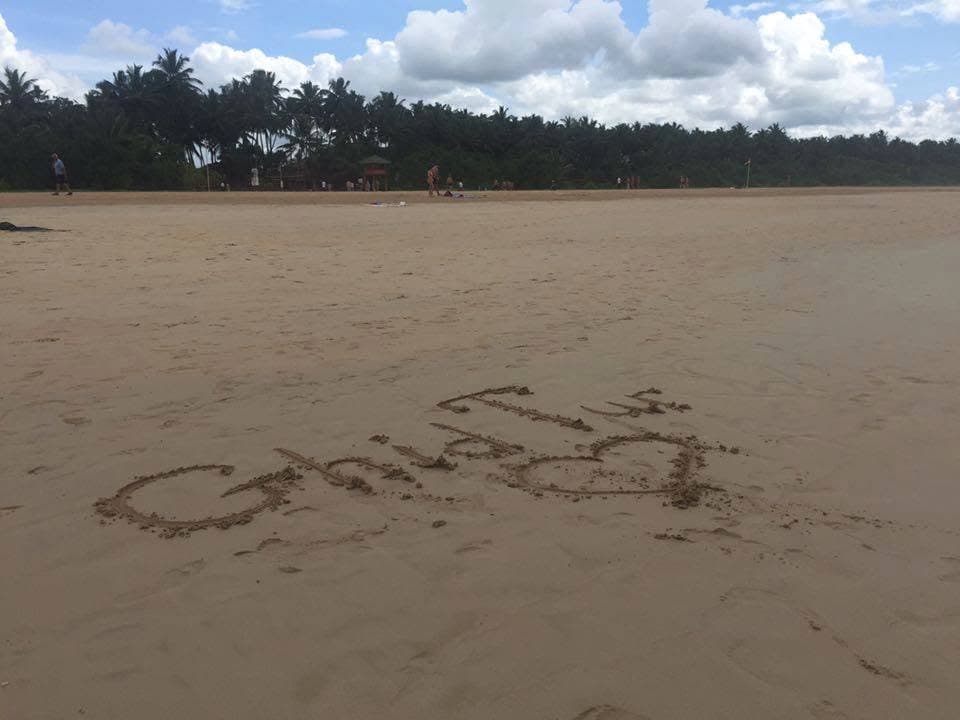 GhidTur and a heart drawn on a wide beach.