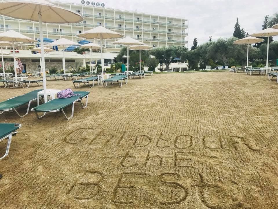 “Ghidtur the best” — a message in the sand outside a hotel.