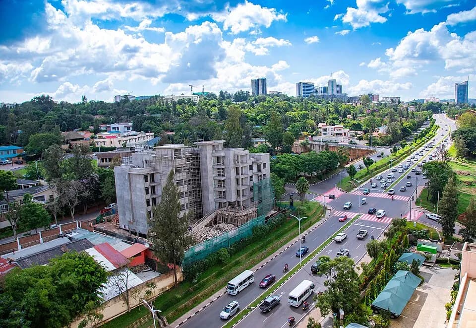 Руанда: High Angle View Of Kigali City Street on November 29, 2018. Most of the people in Rwanda's capital use this kind of transport.Emmanuel Kwizera